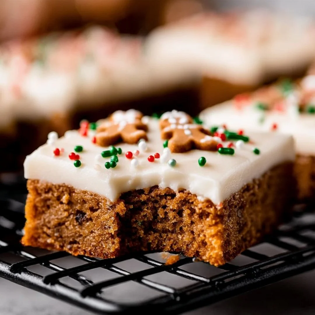 Delicious gingerbread cookie bars topped with festive icing and decorations